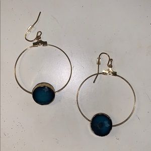 gold hoop earrings with blue stone
